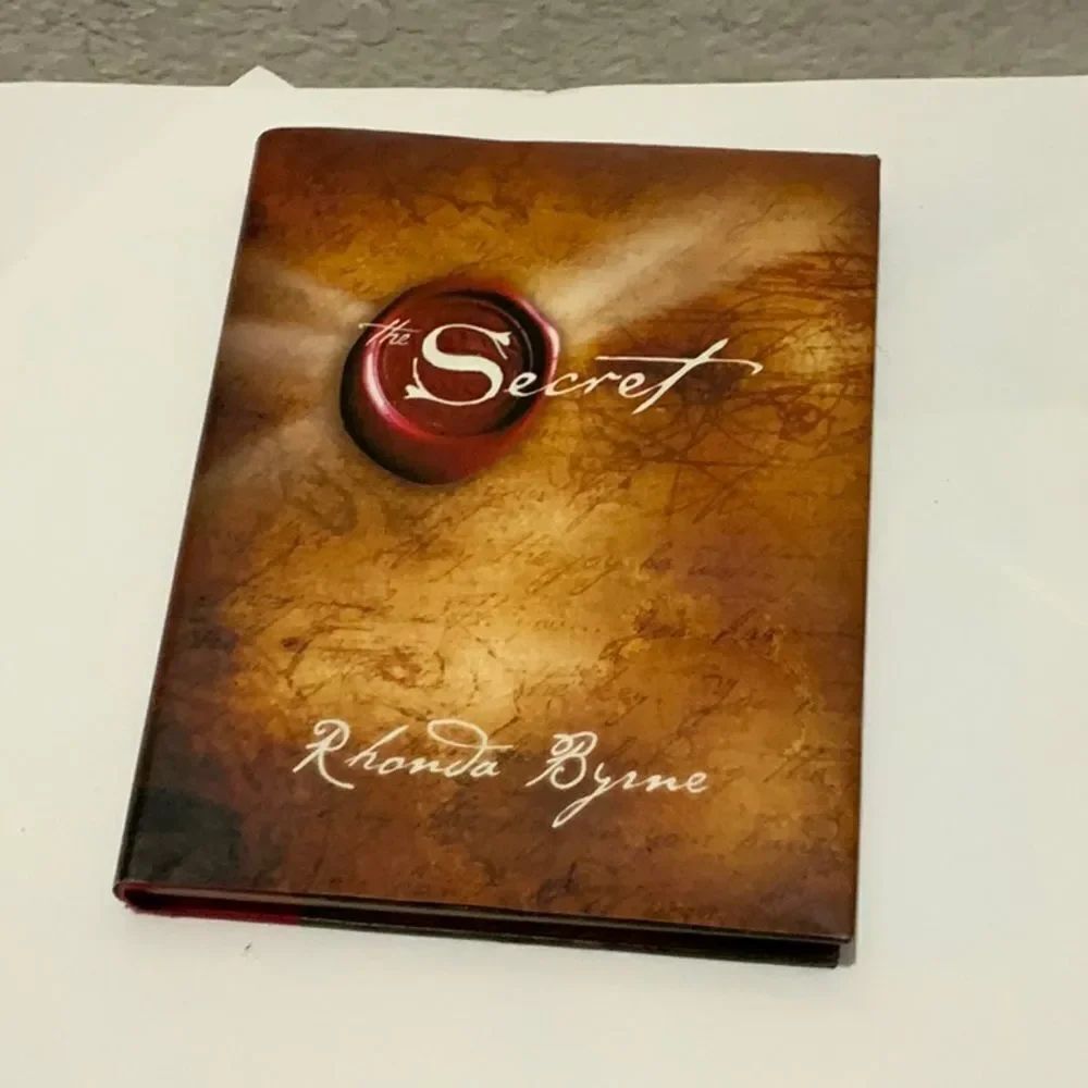 Book “ The Secret “ By Rhonda Byrne from the movie, Law of Attraction.
